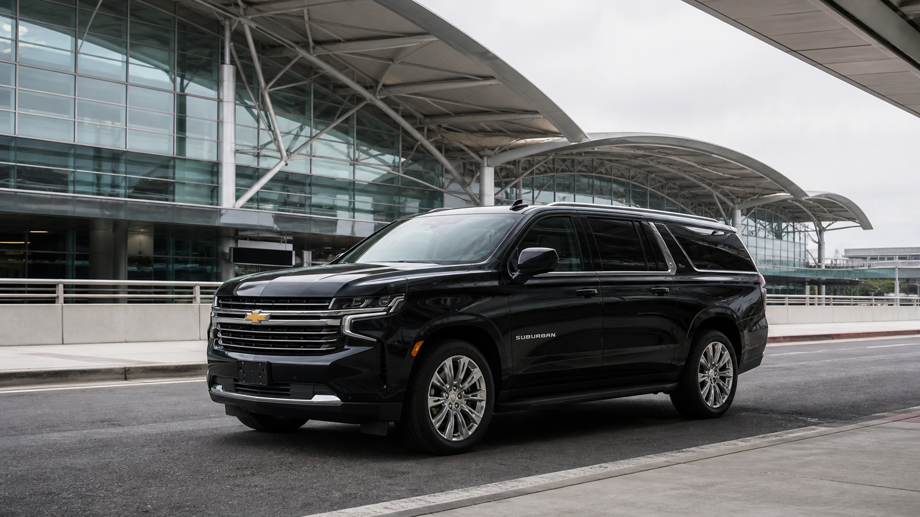Black 2026 Chevrolet Suburban at San Francisco International Airport curbside