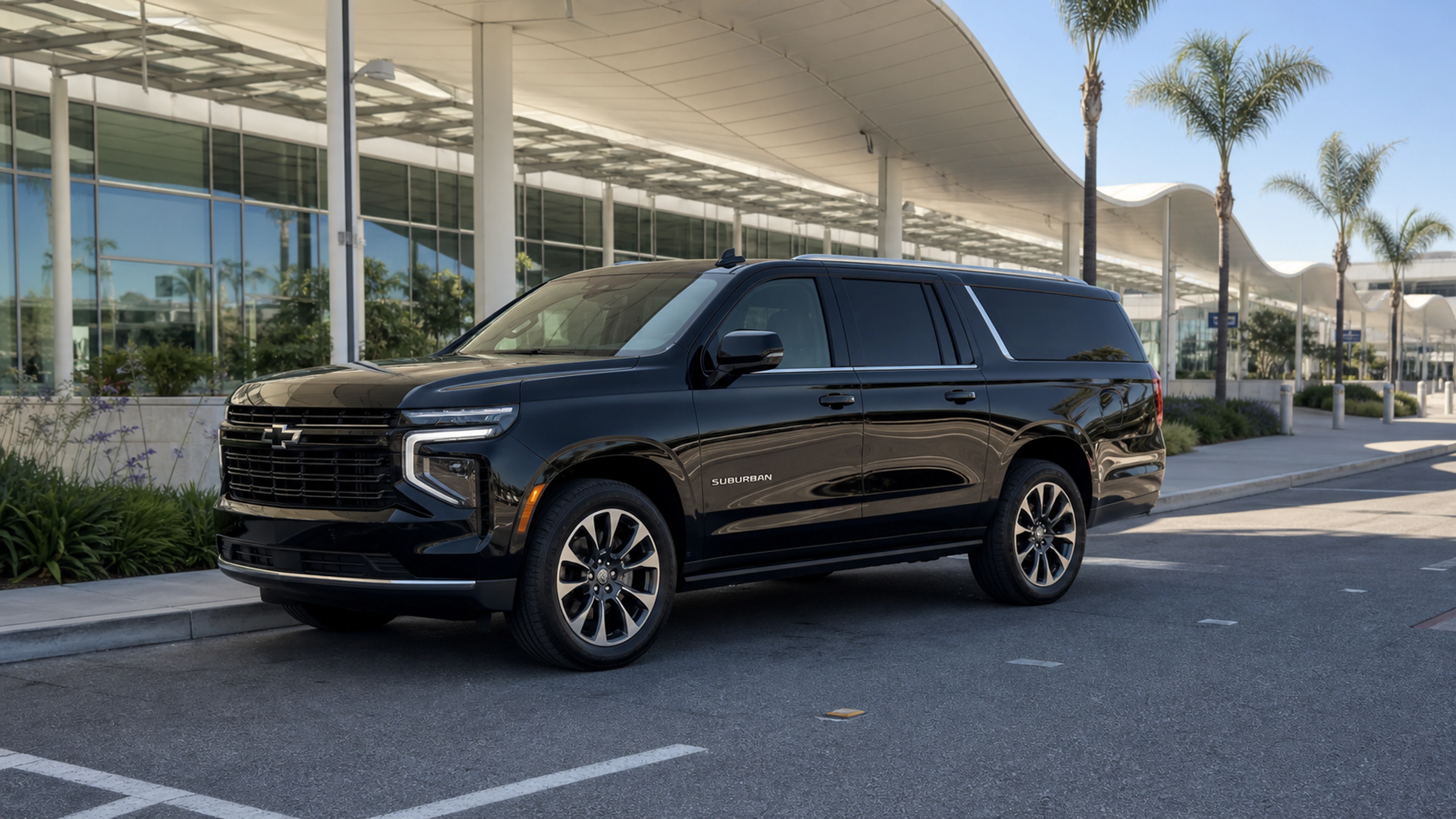 Black 2026 Chevrolet Suburban at San Jose Mineta International Airport curbside